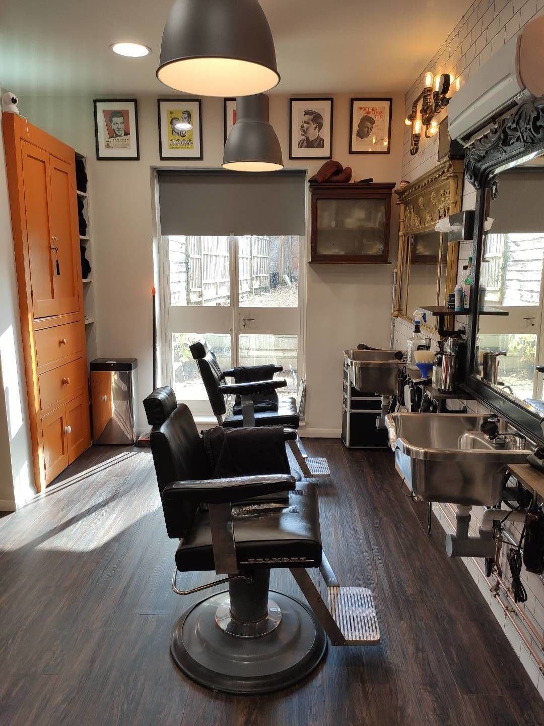 Barber chairs and basins in the morning light