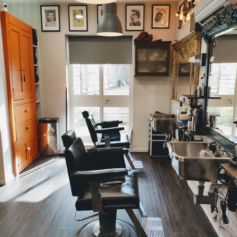 Barber chairs and basins along the wall